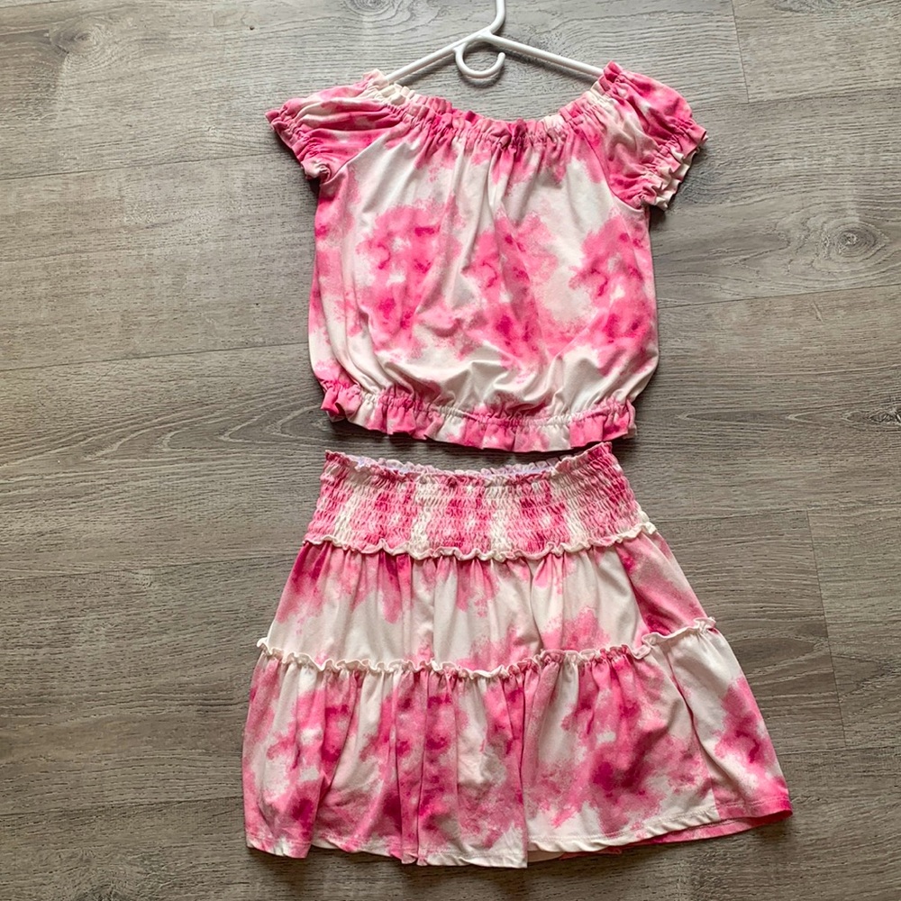 Matching skirt,shirt,brand beautees,size is 12 in kids,color is pink and white